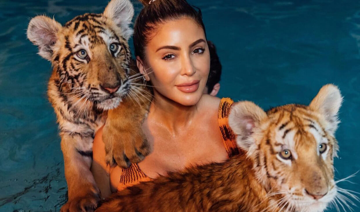 Larsa Pippen’s Sexy Photos With Tigers Trigger PETA To Take Action Against Zoo Owner & ‘Tiger King’ Star Doc Antle!