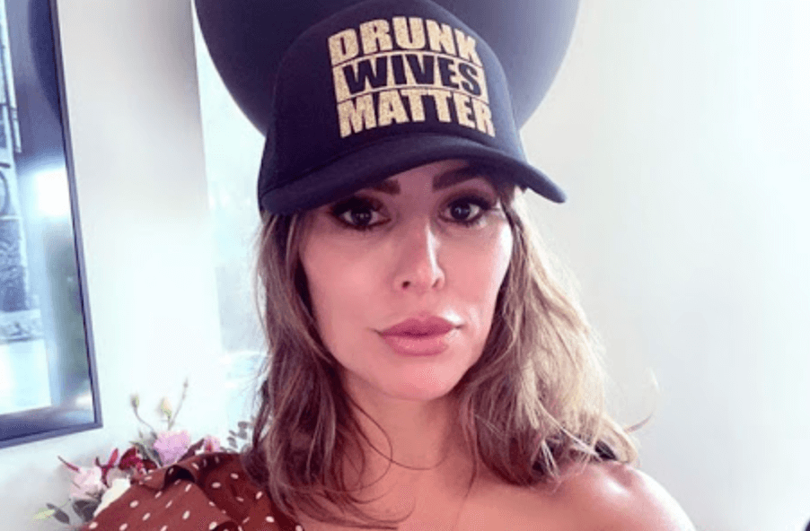 Kelly Dodd Reveals Bravo Fined Her For Wearing ‘Drunk Wives Matter’ Hat!