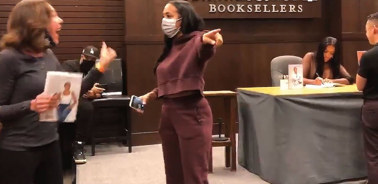 Porsha Wiliams AMBUSHED By Fur Protester During Her Book Signing Event!