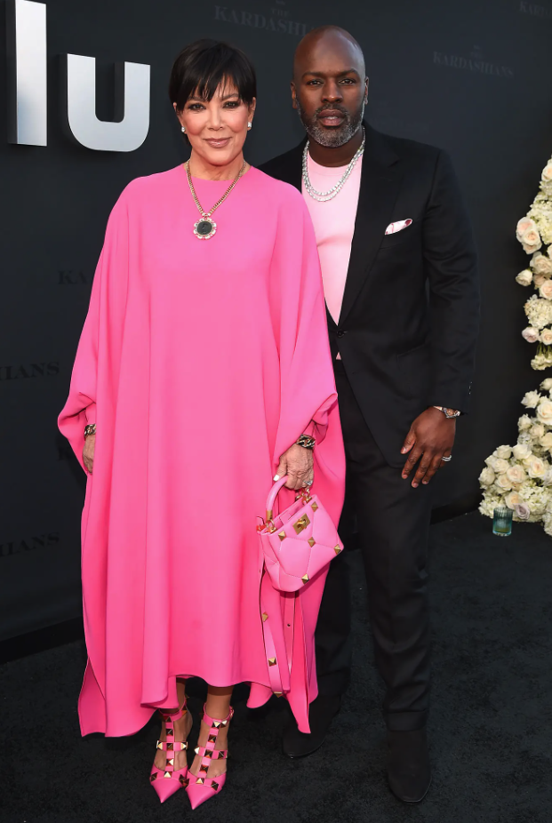 Corey Gamble carries a Hermes shopping bag on Rodeo Drive