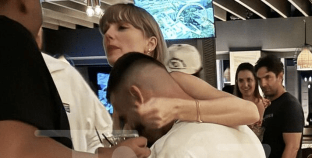 Taylor Swift Playfully Warns Travis Kelce with a Shania Twain Tee