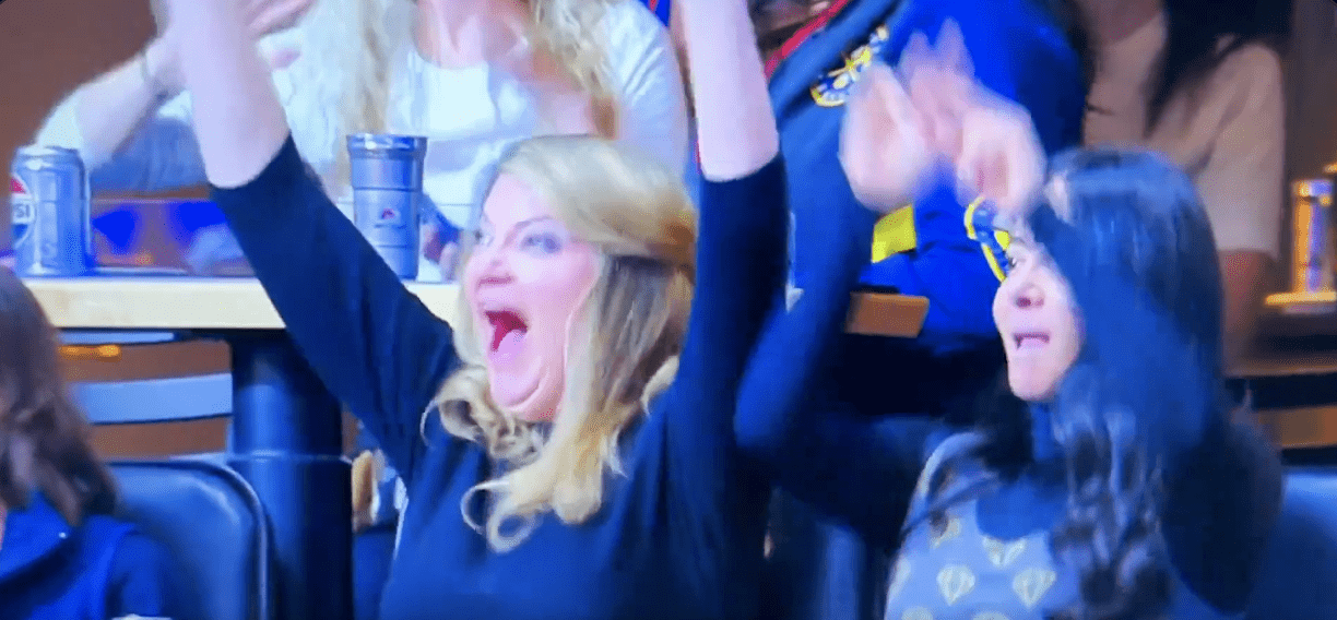 Viral moment at Nuggets vs. Jazz game: a female fan performs a lewd gesture on the Jumbotron, sparking shock and laughter among the crowd