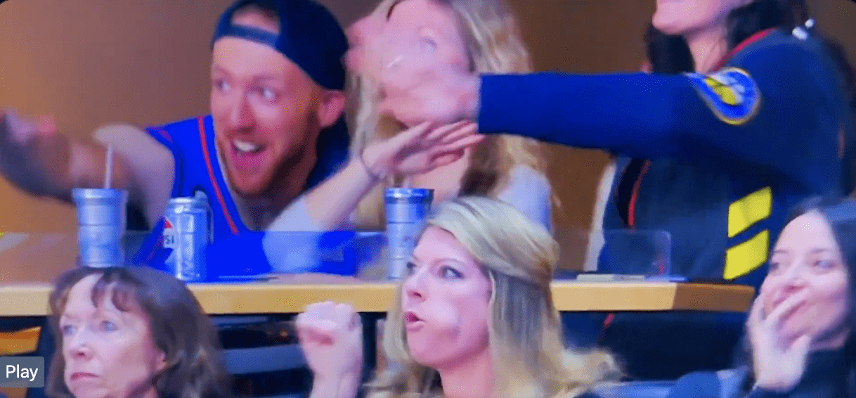 Viral moment at Nuggets vs. Jazz game: a female fan performs a lewd gesture on the Jumbotron, sparking shock and laughter among the crowd